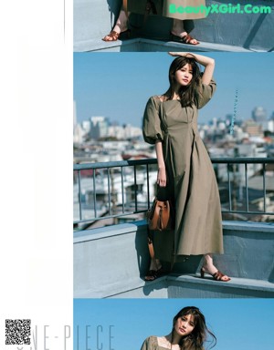 A woman wearing a trench coat standing in front of a window.